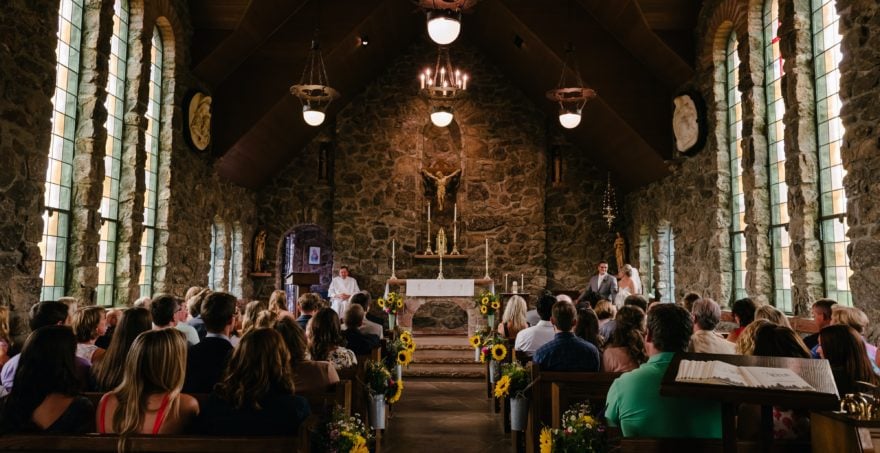 Couple listening to a concert inside a roman church