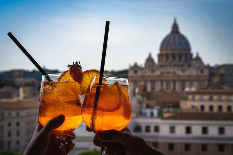 Rooftop aperitivo at sunset rome