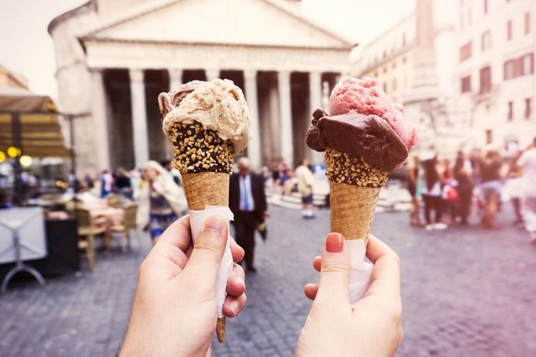 Sweet honeymoon memory—gelato tasting in rome’s charming streets.