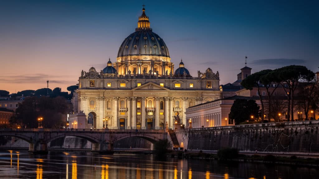 Vatican and St. Peter's Basilica illuminated at twilight